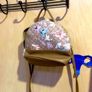 Floral and brown mini back pack/cross body bag